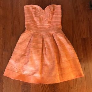 Orange dress with gold accents